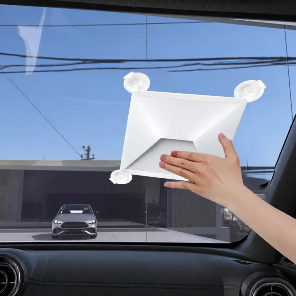 Positioning the Starlink Mini suction cup mount on car glass